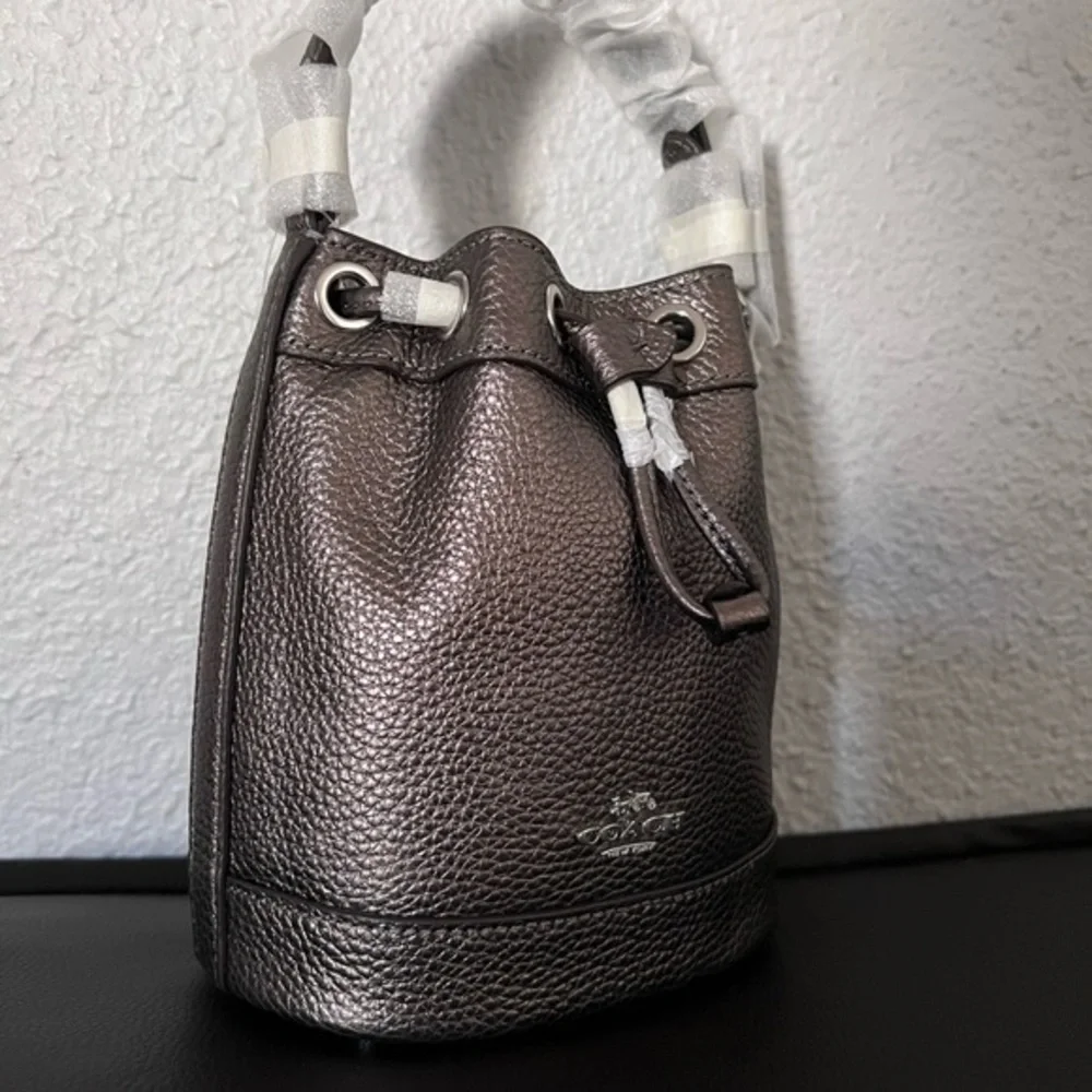 NWT COACH DEMPSEY DRAWSTRING BUCKET BAG 15 IN SILVER/METALLIC GUNMETAL CROSSBODY